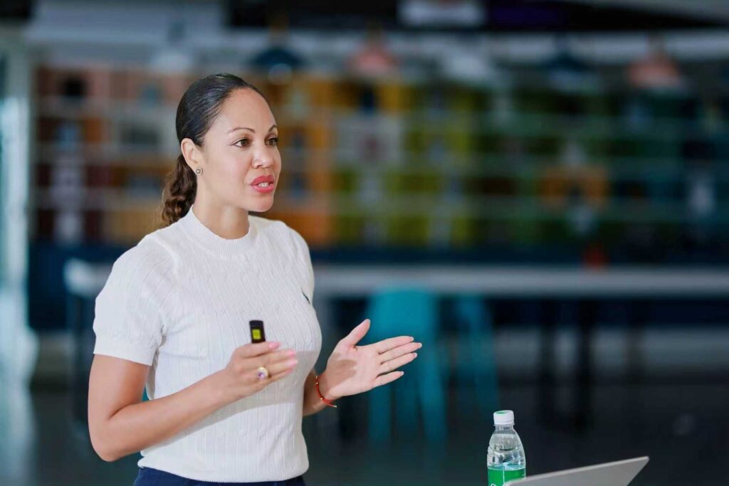 founder and ceo francine carron speaking at a conference